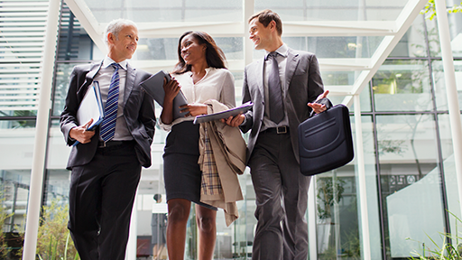 Employees talking while leaving building